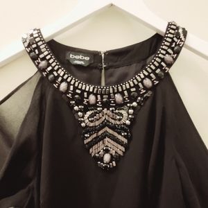 bebe very short dress with open shoulder sleeves XS with jewels and beads detail